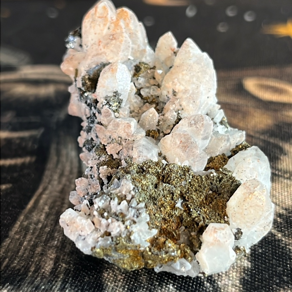 Pink quartz on pyrite and epidote